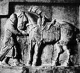 Из погребения императора Тайцзуна в Сиане. 637. Воин, вынимающий стрелу из груди раненого коня.